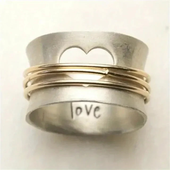 Vintage liefdesring in goud en zilver