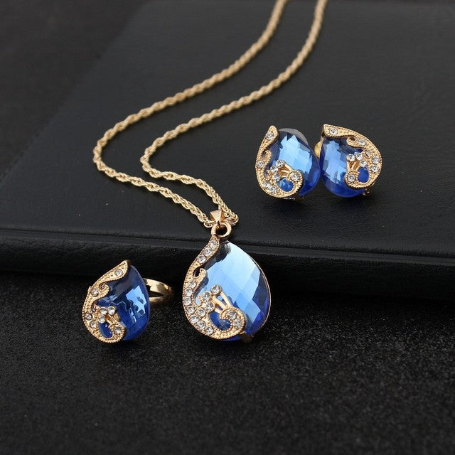 Set Ketting + Oorbellen Blauwe Kristallen Druppel in Goud